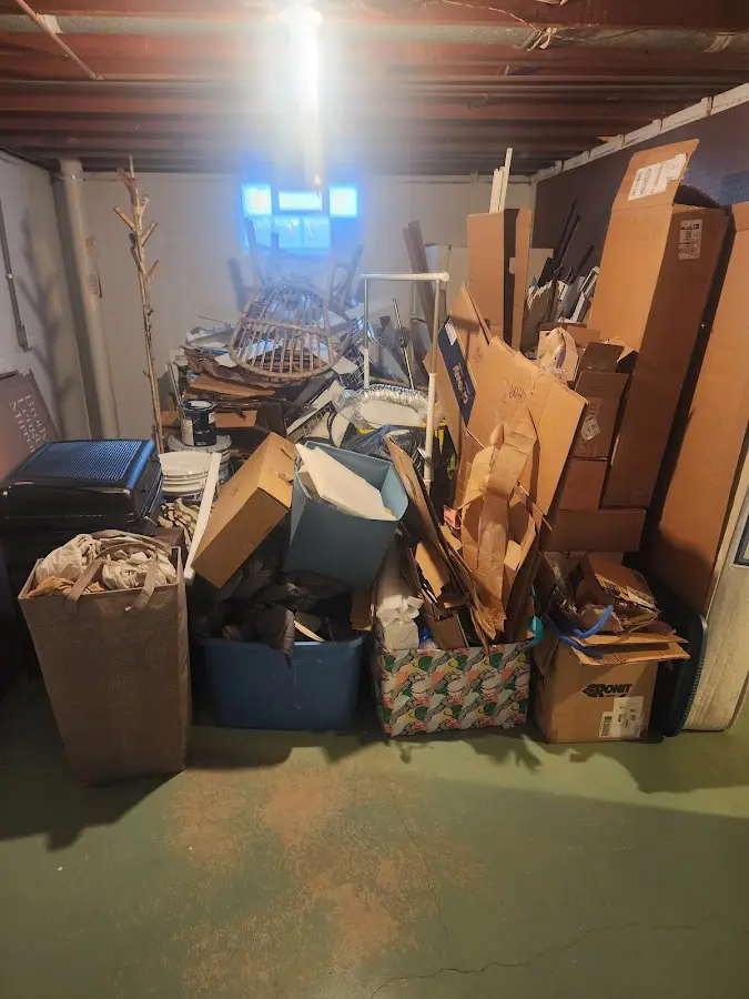 Roll-off dumpster container at job site for Construction Dumpster Rental in Sweeny